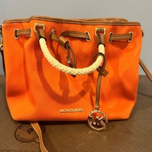 Michael Kors orange bucket style bag